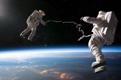 Two astronauts in space