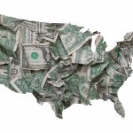 An outline of the United States filled with dollar bills